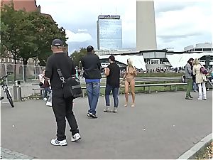 platinum-blonde Czech nubile displaying her steaming figure naked in public