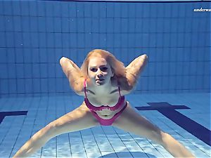 warm Elena displays what she can do under water
